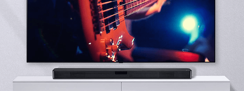LG SL4Y vor Fernseher